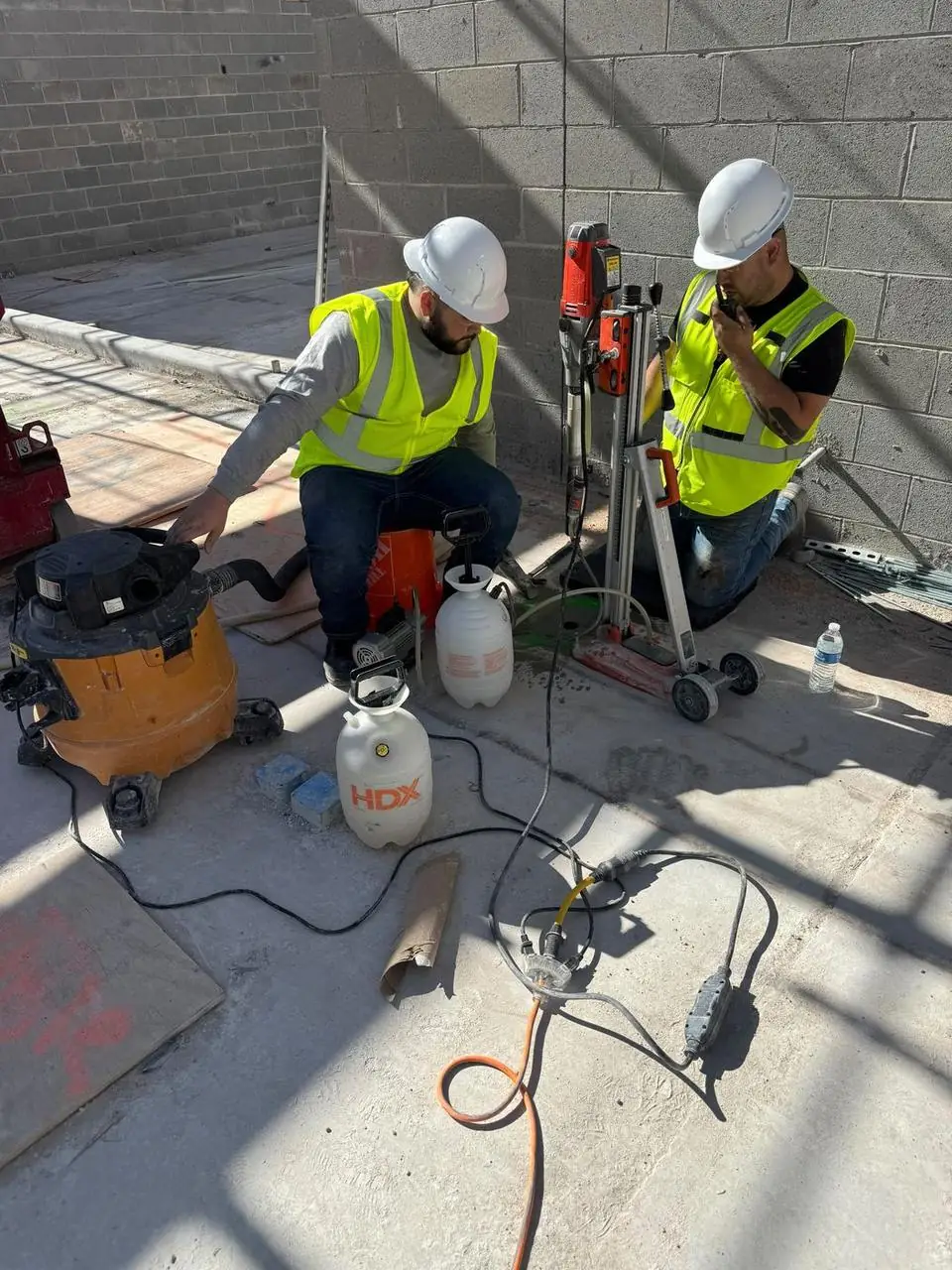 Fuenco crew drilling concrete